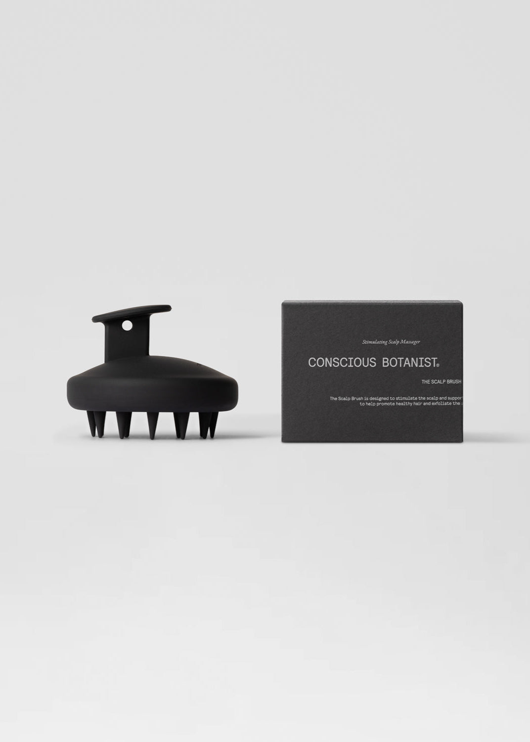 Silicone scalp brush massager. 100% silicone bristles for scalp stimulation and enhanced circulation, promoting hair growth. Cepillo masajeador de silicona para el cuero cabelludo. Estimula el cuero cabelludo, mejora la circulación y fomenta el crecimiento del cabello.