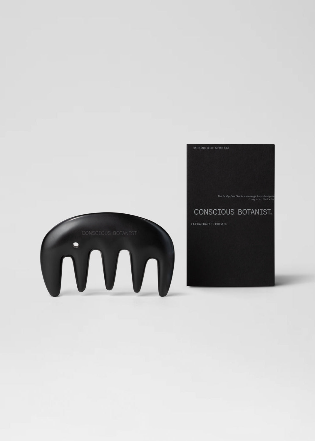 Bian stone scalp gua sha. 100% high-quality bian stone for scalp massage, increased circulation, hair growth stimulation, and muscle relaxation.. Gua sha para cuero cabelludo hecho de piedra bian. Masajea el cuero cabelludo, mejora la circulación, estimula el crecimiento del cabello y relaja los músculos.